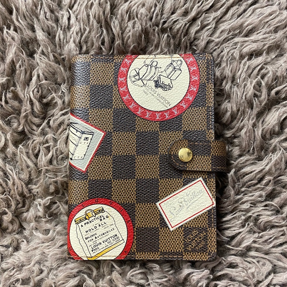Louis Vuitton Damien limited luggage print agenda.